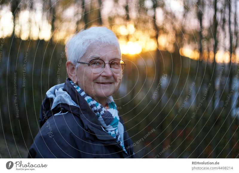 Portrait of a senior citizen at sunset - a Royalty Free Stock