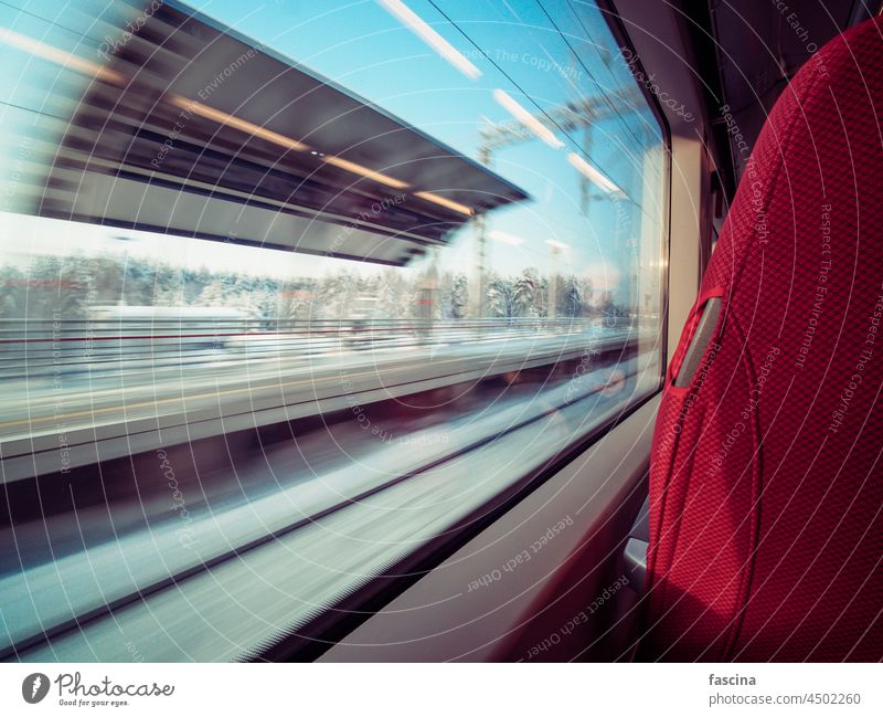 Motion railway platform through window railway car train motion transportation travel speed view movement background blur journey chair outdoors fast passenger