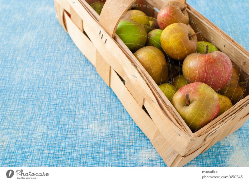 Boskop Apples in a Basket on blue background - thanksgiving Food Fruit Dessert Nutrition Picnic Organic produce Diet Fasting Healthy Thanksgiving Wood Happy