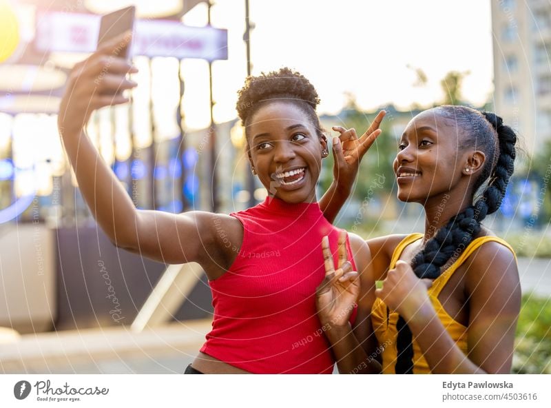 people laughing together outside