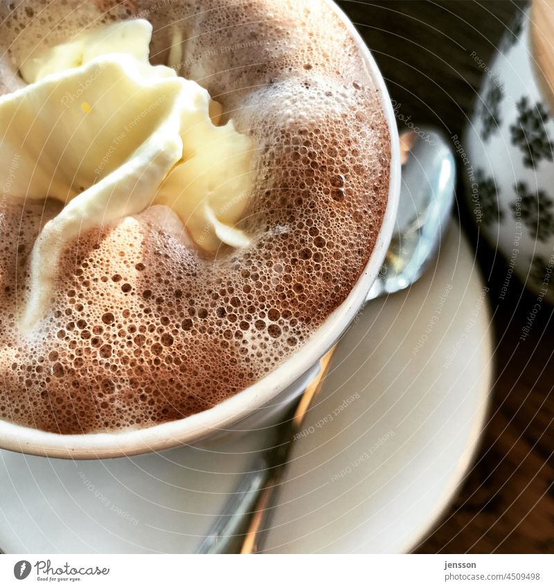 A cup of hot chocolate with cream Detail Hot Chocolate Hot chocolate enjoyment Café Cup Foam Cream icing on the cake Hot drink Delicious cute Mug Spoon