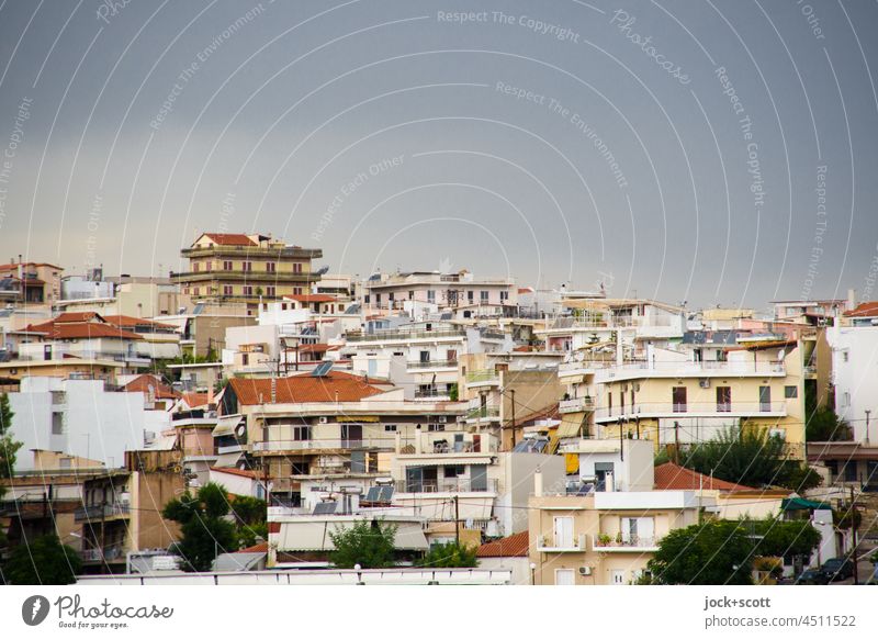 Houses on the hill after the rain Sky Hill Greece Chalkida Euboea Many Town house (City: Block of flats) Quarter Urban development Flat roof Sunlight