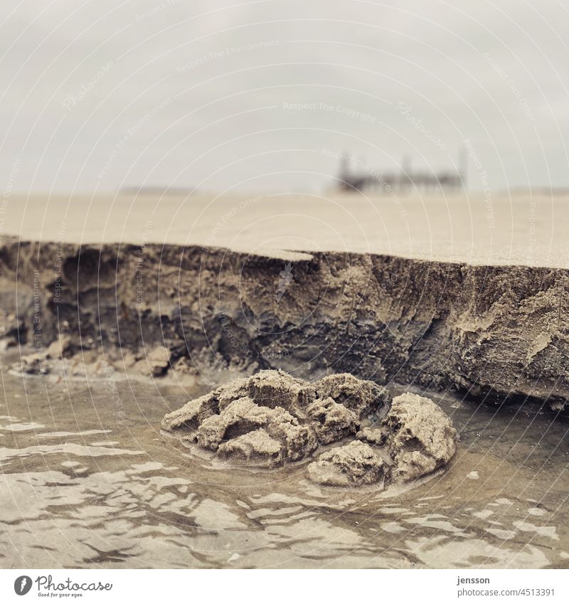 Break-off edge of a tideway at the North Sea beach of St. Peter-Ording Sand Mud flats North Sea coast Tideway break-off edge Detail Worm's-eye view