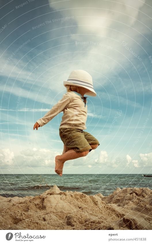 up and away... Joy Leisure and hobbies Playing Vacation & Travel Freedom Summer Summer vacation Beach Ocean Child Toddler 1 Human being Hat Movement Flying Jump