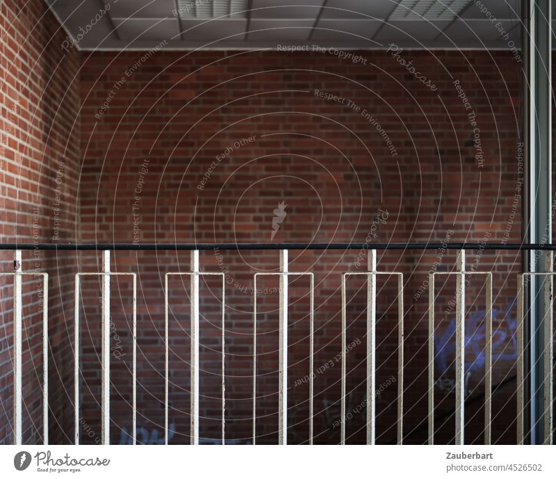 Railing in front of brick wall in stairwell rail Staircase (Hallway) White Black Building GDR Architecture Banister Wall (building) Wall (barrier)