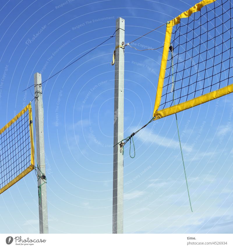 Network - sunny volleyball nets for two courts in front of blue sky Volleyball net Ball sports Ball game Pole Bracket Sky confirmation Band String
