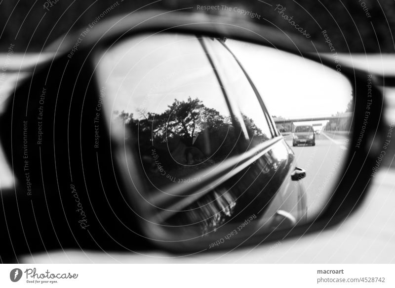 Column Rear view mirror car Highway drivers look back black and white Driving Transport Past ensue Pursue ways streets