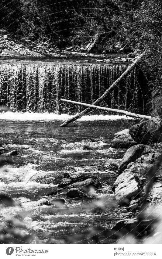 Cross made of tree trunks in front of waterfall. Waterfall Nature Crucifix cruciform vivacious Habitat life-giver Elements Brook