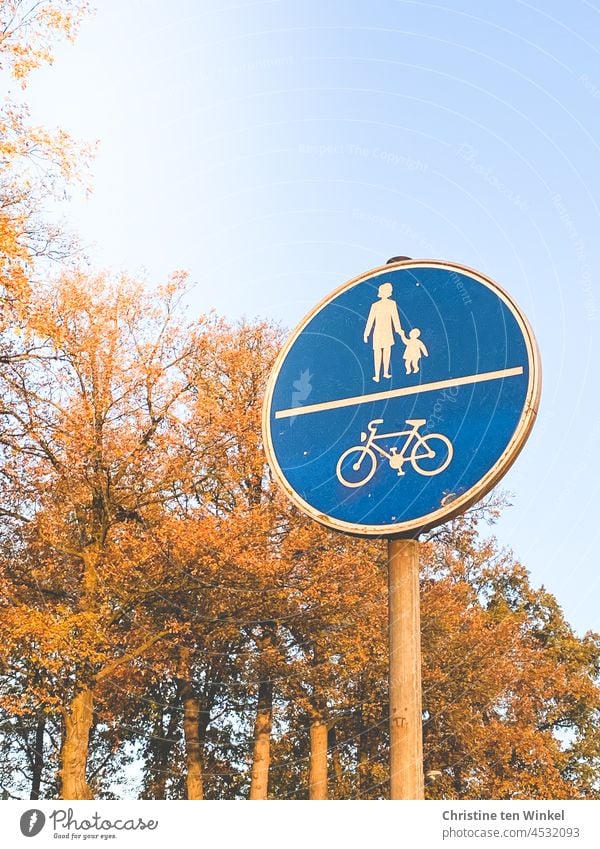 Passage forbidden with round traffic sign in front of blue sky in