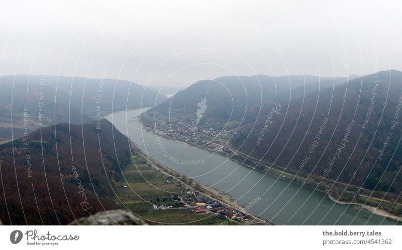 River with mountains and villages on both sides in the fog Autumn Danube Village Villages Fog November Nature Landscape Forest Exterior shot Deserted Hill