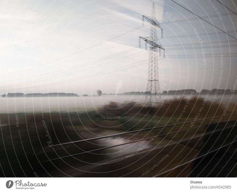 train ride Train Track voyage Window Speed pylon Railroad tracks rails Morning Fog Landscape swift blurred motion blur Nature turnaround relaxed Transport