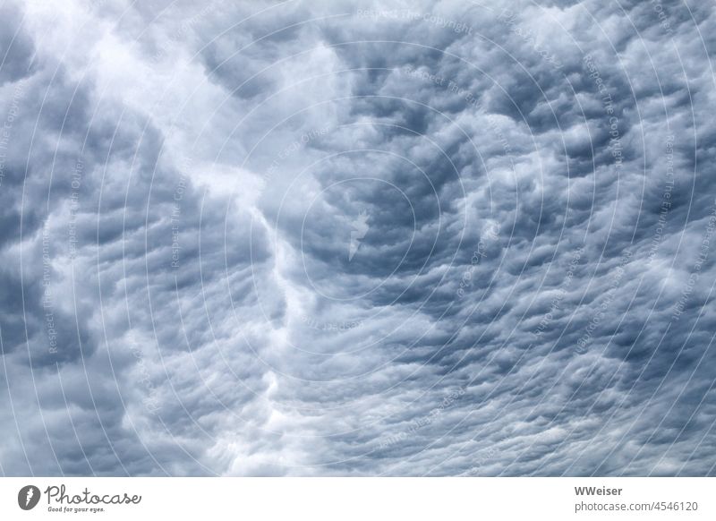 The clouds form a rugged landscape in shades of grey-blue Sky Clouds Landscape Looking Evening Rain Weather Thunder and lightning Storm Bad weather Storm clouds