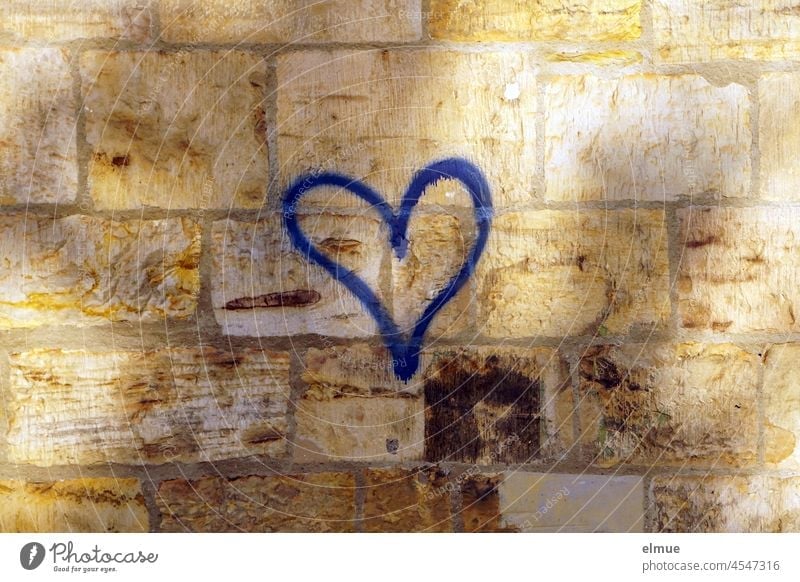 a blue heart on a sandstone wall / love / declaration of love Heart Graffito Blue Wall (barrier) have a crush Love Graffiti Light and shadow bricks Facade