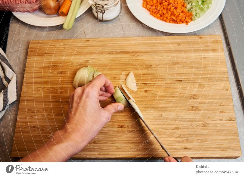 Woman chopping onion in kitchen, close up slice vegetable cutting woman cook chef clean cooking food health life nutrition vitamin background bio board diet