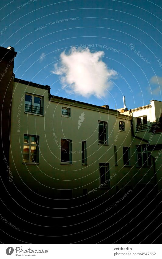 Cloud over the roof Old building on the outside Fire wall Facade Window House (Residential Structure) Sky Sky blue rear building Backyard Courtyard