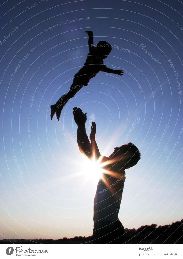 Look at me, I'm flying! Family & Relations Man Child Sun silouette pitch Dusk