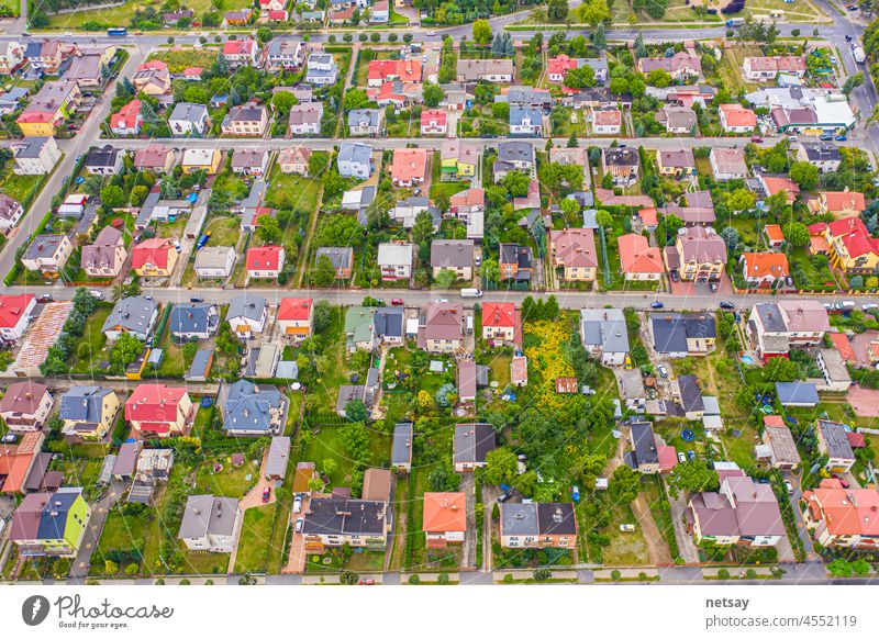 neighborhood with residential houses and driveways, land use planning concept property aerial background survey surveyor view above city road architecture