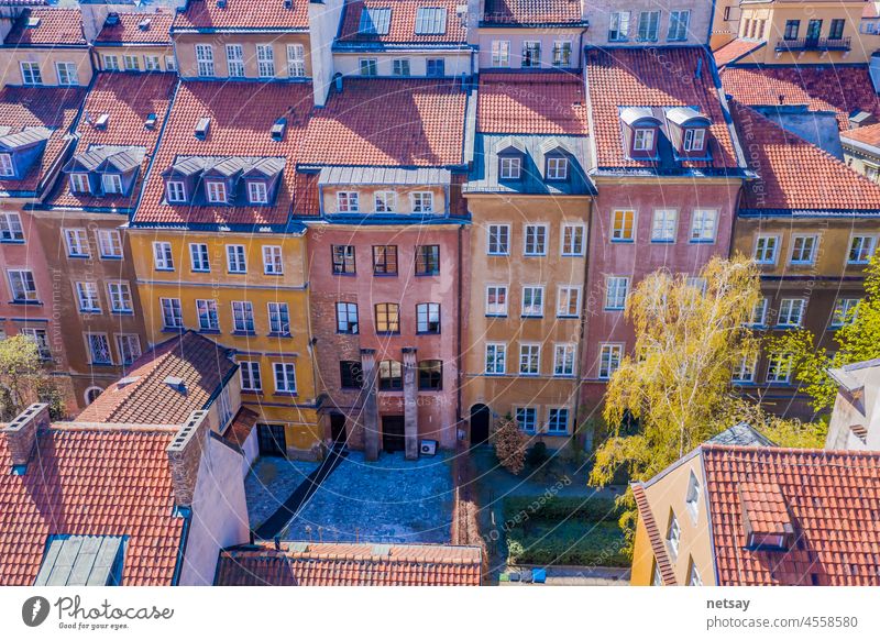 Old town square with historic street town architecture and windows multicolored pattern of pink and yellow vintage color buildings Ancient Apartment