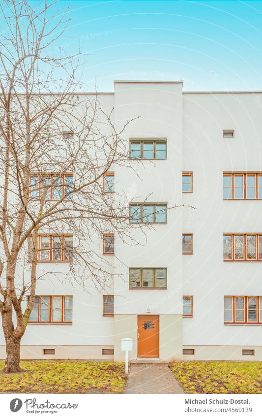 Bauhaus with red door Magdeburg modern new Build Architecture curie minimum Colour shape surface Geometry Window Esthetic New building apartment building