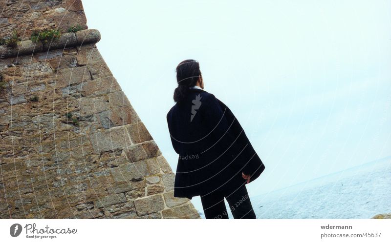 Man looking at the sea Sky Ocean Wall (barrier) Coat Long-haired Light blue back lon hair