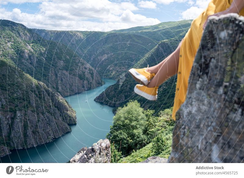 Unrecognizable female traveler enjoying freedom in mountains over canyon woman admire ribeira sacra syl canyon galicia spain nature river edge landscape