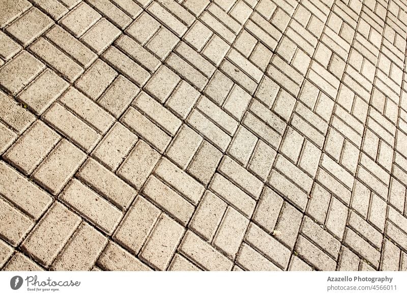 Diagonal view of pavement with geometric stone layer. minimalism background texture diagonal angle decoration flooring closeup subway tiled mosaic patio grunge