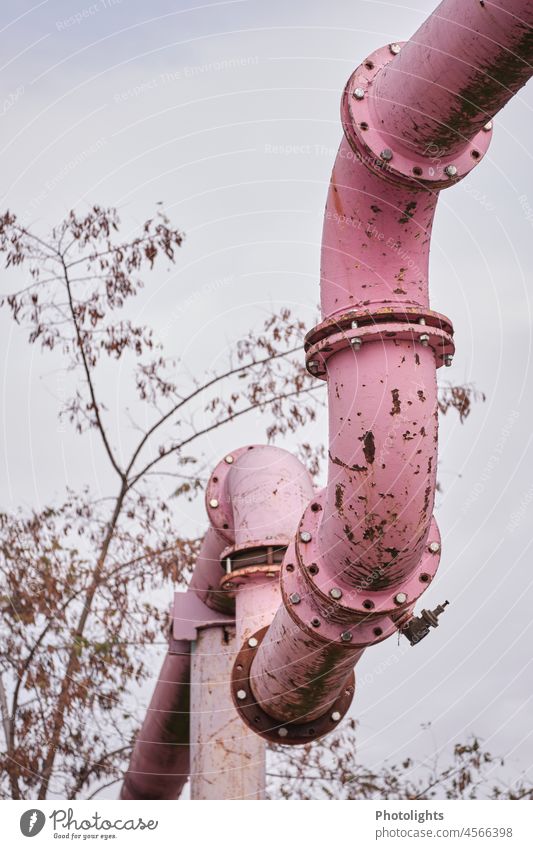 Pink tube winds in the height conduit Conduit pink Colour photo Effluent Water pipe Transmission lines Provision Technology Bend Construction site