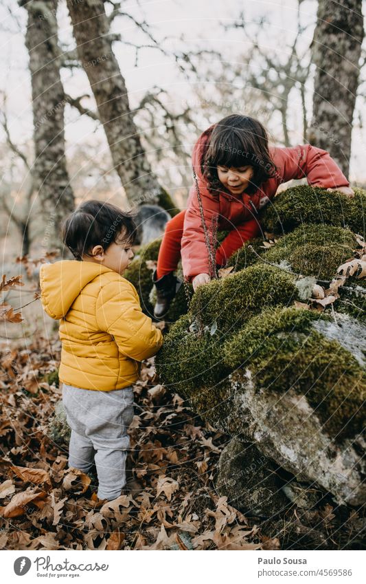 Brother and sister playing on the forest Child childhood Brothers and sisters Caucasian 1 - 3 years 3 - 8 years Boy (child) Girl Authentic Winter Autumn