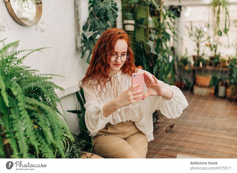 Woman with reusable string bag of tangerines in garden - a Royalty Free  Stock Photo from Photocase