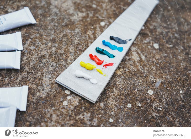 Simple color test with oil paint painting art artist artistic colorful student close close up recycled recycling material palette basic still life background