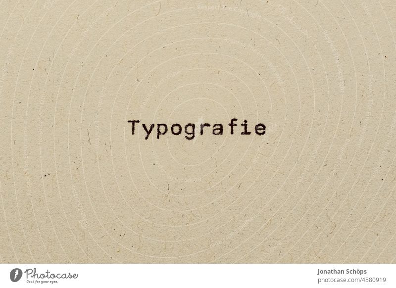 Typography as text on paper with typewriter Paper Recycling Typewriter writing typography Analog Retro Text Copy Space vintage Word Communication