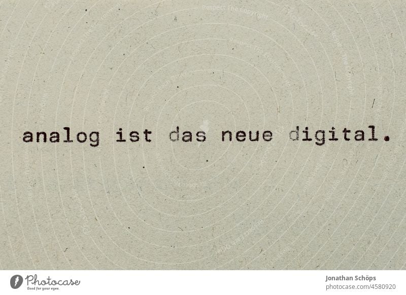 analog is the new digital as text on paper with typewriter Paper Recycling Typewriter writing typography Disagreement Analog both Digital Retro Text Copy Space