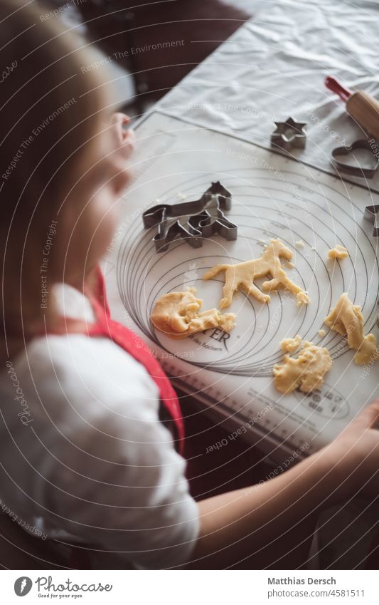In the Christmas bakery Christmas baking Child children Baking Christmas & Advent Cookie Christmas biscuit Baked goods cute cookie cutter Delicious cookie dough