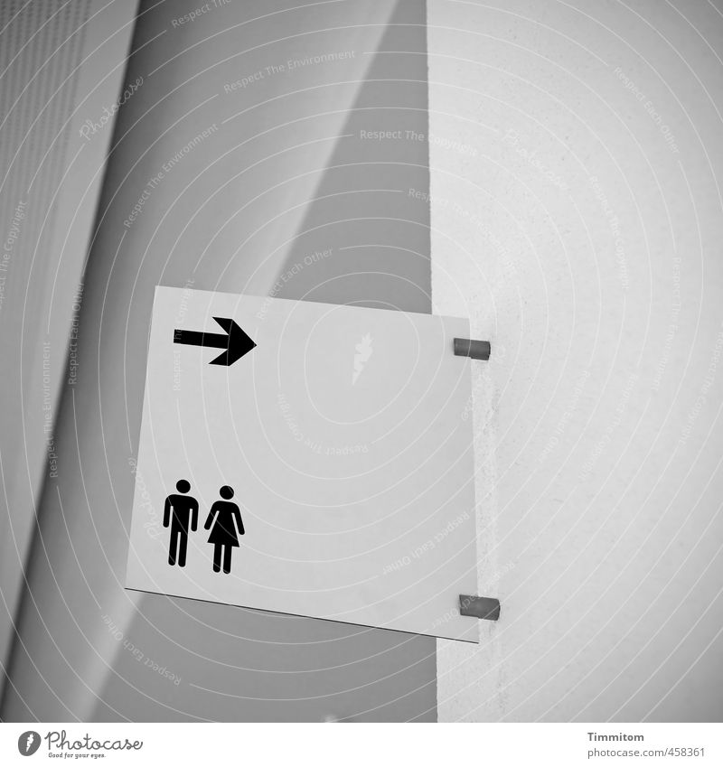 Couples to the right! Hallway Corridor Wall (building) Ceiling Concrete Plastic Sign Signage Warning sign Arrow Man Woman Esthetic Simple Gray Black Emotions