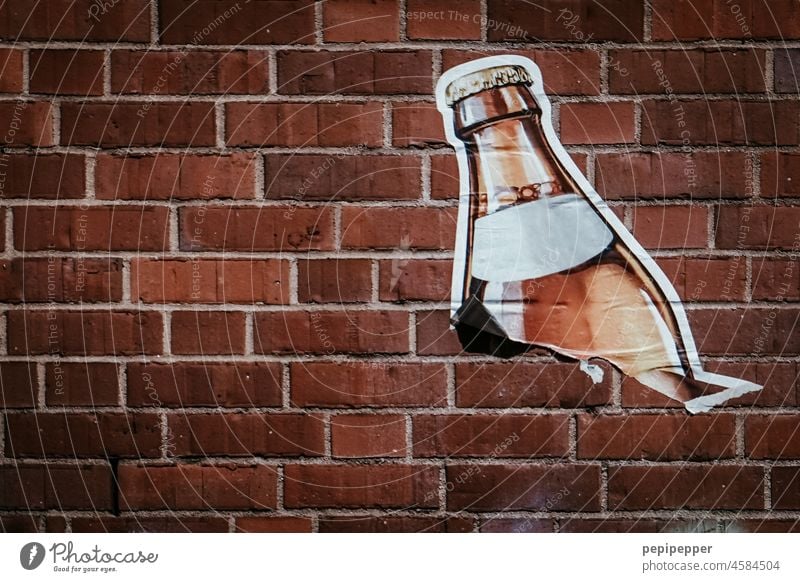 halBIERt - Beer advertising on a brick wall beer advertising Alcoholic drinks Bottle Bottle of beer Beer bottles Beverage Colour photo Brown Neck of a bottle