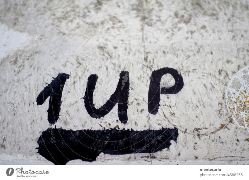 unnecessary | pointless black on white Abstract Characters Word Surface Smeared Graffiti Typography coarsely Opinion Code Sign Daub invitation writing
