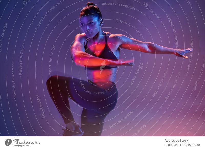 Confident sportswoman exercising with elastic band - a Royalty Free Stock  Photo from Photocase