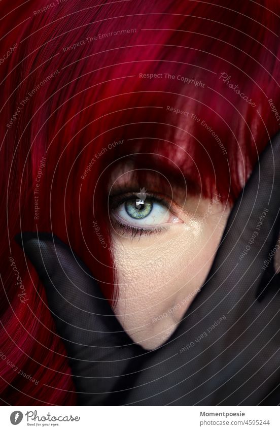 covert Eyes Looking moment glove Face Mystery Human being Woman Fingers Hand mask sb./sth. Concealed Red-haired red hair Skin pores Mysterious mystery secret