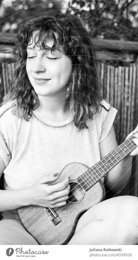 black and white portrait of a woman playing ukulele Woman Relaxation Nature naturally Style Playing Guitar romantic Exterior shot Vacation & Travel Easygoing