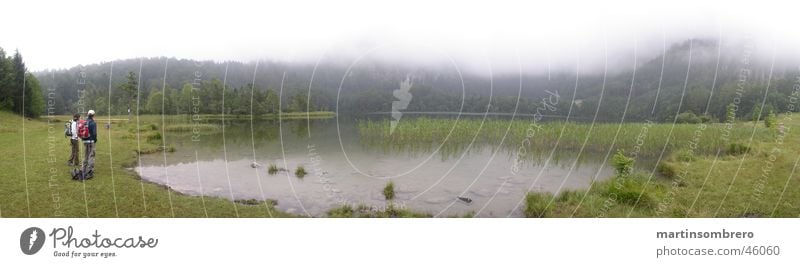 Lake in the fog Fog Hiking Man Woman Grass Body of water Green Mountain Nature Landscape