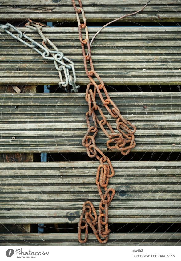 chain reaction Chain Chain link Attachment Firm Detail anchored floor Colour photo Iron chain Connection Strong Jetty Old rusty Under Subdued colour Close-up