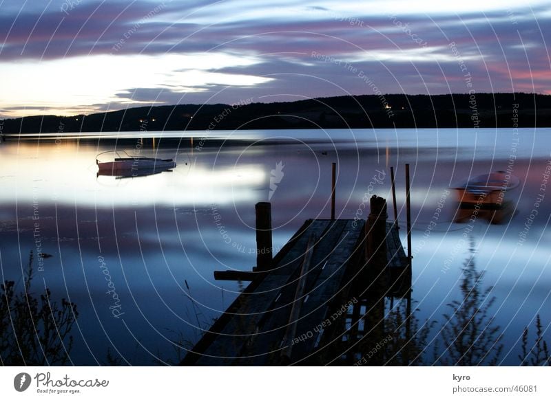 lake of fairy tales Lake Calm Long exposure Aperture Cold Watercraft Footbridge Wood Beach Reflection Clouds Bad weather Wet Dark Night Smoothness Colour River