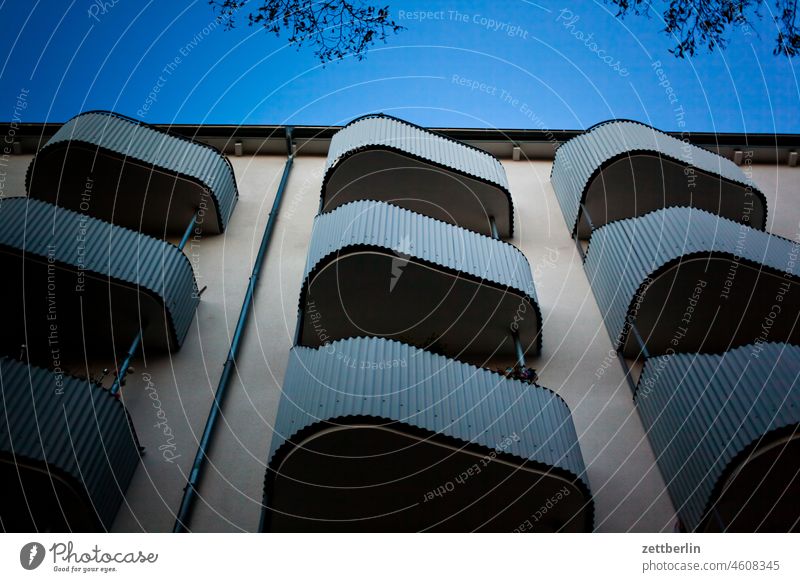 Balconies in the evening Old building on the outside Balcony Fire wall Facade House (Residential Structure) Sky Sky blue rear building Backyard Courtyard