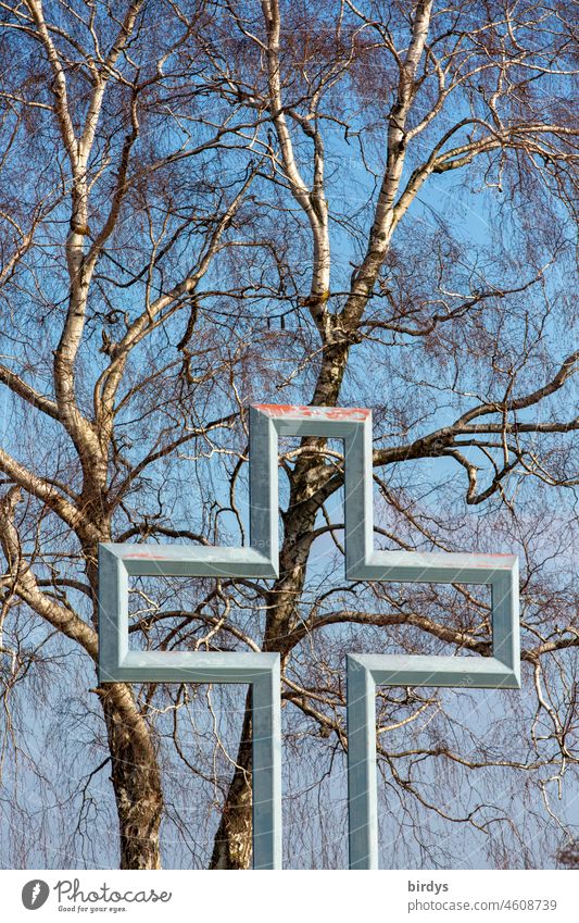Outline of a Christian cross in front of a birch tree , cloudless sky. Christianity Crucifix Church Religion and faith Symbols and metaphors Catholicism