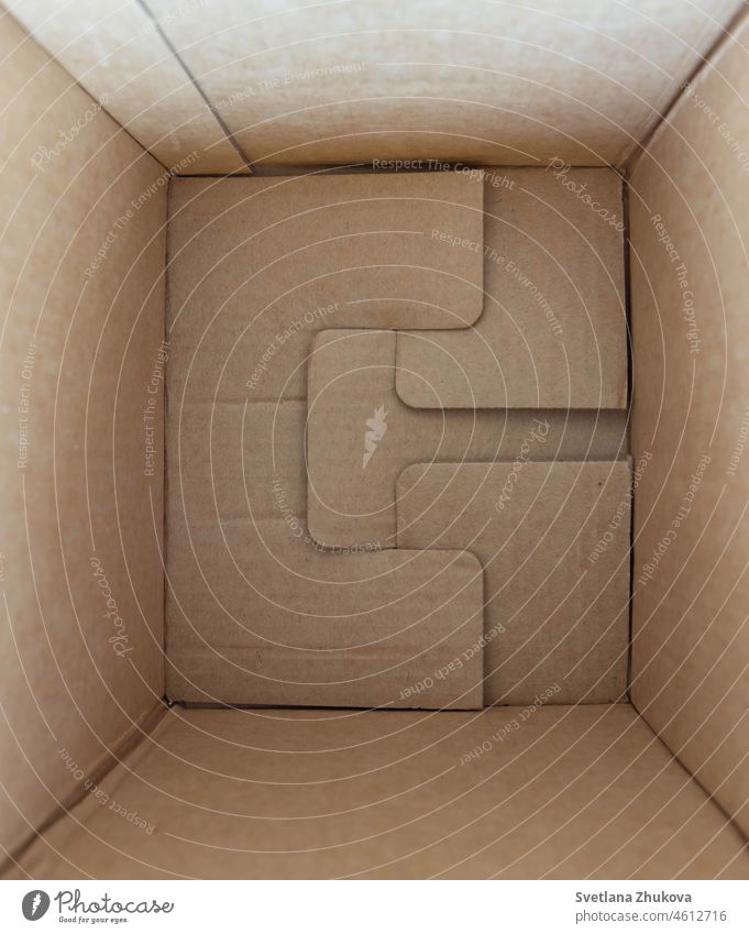 Inside view of empty brown cardboard box. inside packaging carton online shopping gift bottom container cartoon paper recycling parcel package packet surprise