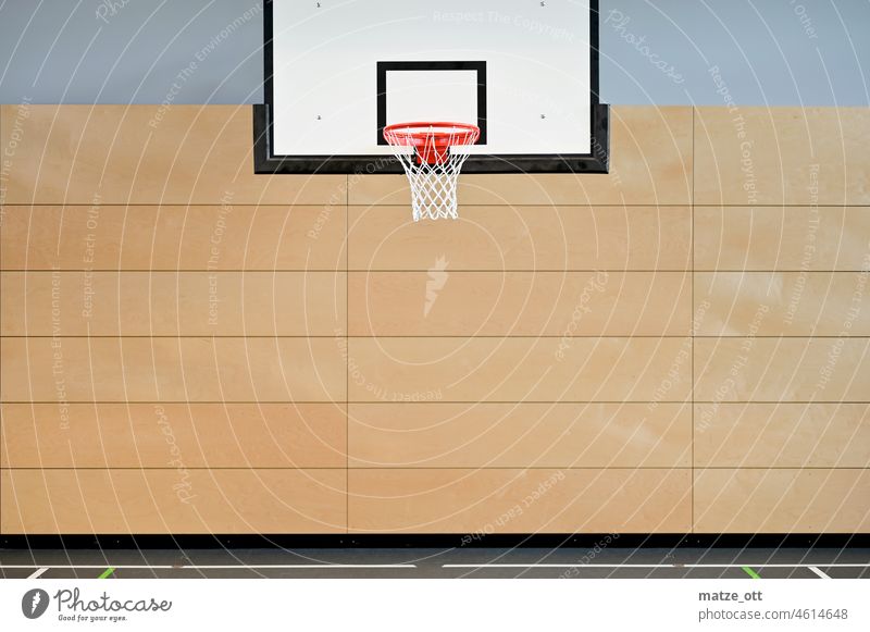Basketball hoop in a gym Sports Basketball basket Gymnasium indoor sports Ball sports board Wall (building) Line Direct Pattern Net Ring Throw-in Deserted