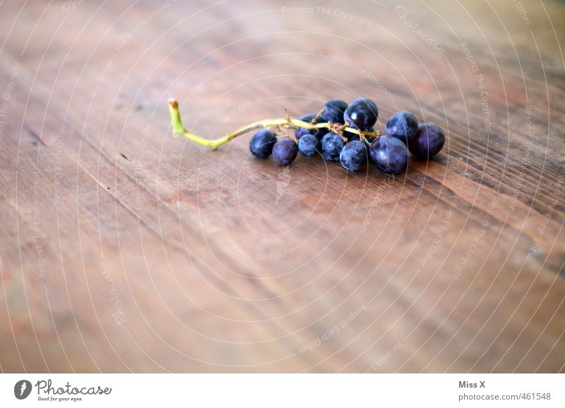 grapes Food Fruit Nutrition Organic produce Vegetarian diet Fresh Healthy Juicy Sour Sweet Blue Violet Bunch of grapes Vine Wooden table Colour photo