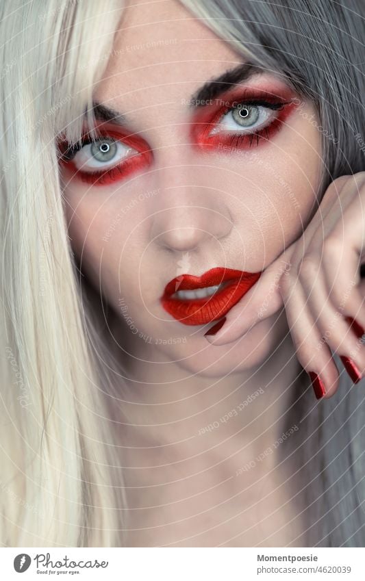 red made up woman face surrounded by white and gray hair Red Beauty Photography pretty eyes Mouth Lips sexy red lips look White-haired platinum blonde Blonde