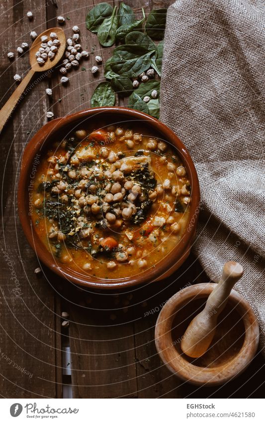 Vegan food. Chickpeas with chard. Potaje is a typical Spanish food vegan stew chickpea cooked traditional homemade spanish spinach plate dish vegetable rustic
