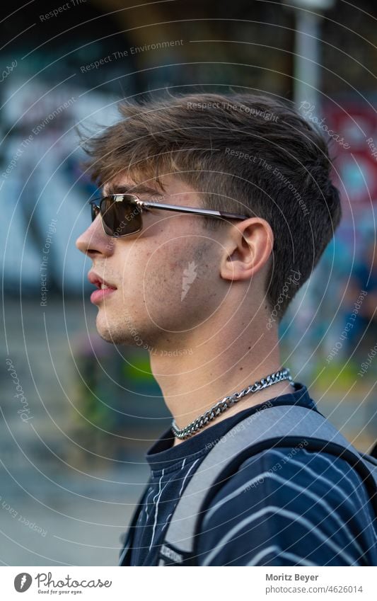 Side profile with chain and sunglasses - a Royalty Free Stock